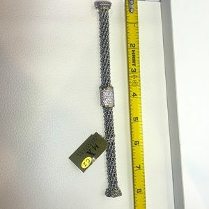 Silver beaded bracelet gold accent with a hint of rhinestones. Magnetic closure